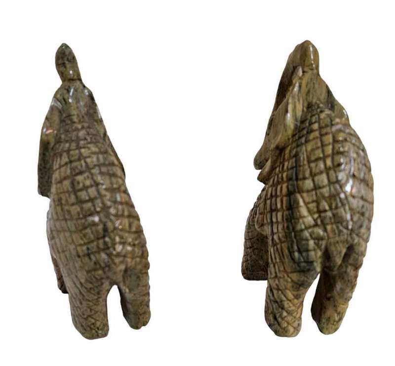 Pair of heavy hand-carved stone elephants