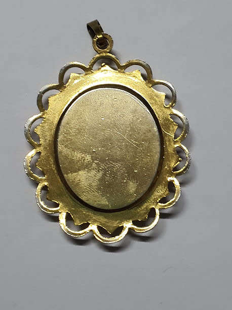 Forget me not pendant with a gold tone