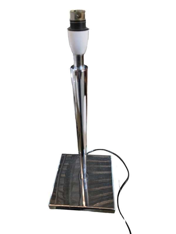 Illuminate your space with this elegant and modern 46cm Silver Metal Table Lamp