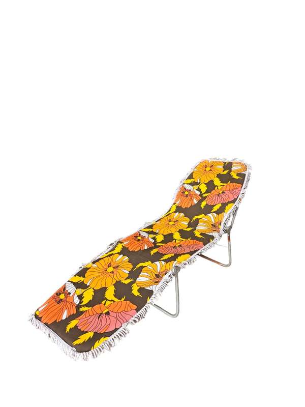 Mid century fold up sun lounger, the perfect addition to any retro-inspired outdoor space