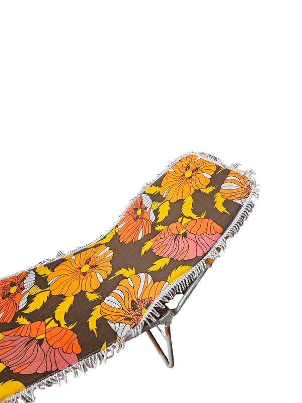 Mid century fold up sun lounger, the perfect addition to any retro-inspired outdoor space