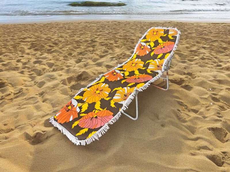 Mid century fold up sun lounger, the perfect addition to any retro-inspired outdoor space