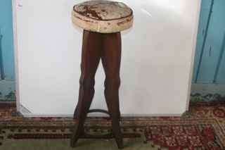 Magnificent vintage bar stool with wooden lady legs