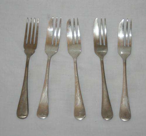 FIVE MAGNIFICENT SILVER PLATED CAKE FORKS