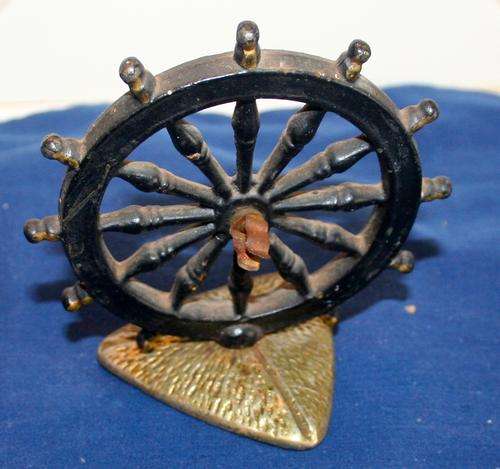 AN BEAUTIFUL LITTLE METAL SHIPS WHEEL