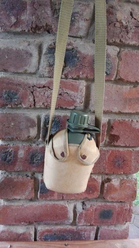 ARMY WATER BOTTLE WITH WEBBING STRAP AND WEB BELT LOOPS  (  see photographs )