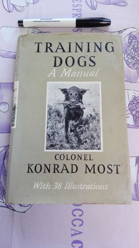 TRAINING DOGS A MANUAL Colonel KONRAD MOST (Hardcover ;  Illustrated )