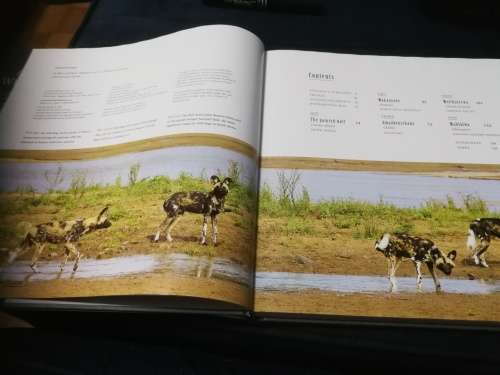 Signed by both Authors IN SEARCH OF THE AFRICAN WILD DOG ROGER and PAT DE LA HARPE  signed