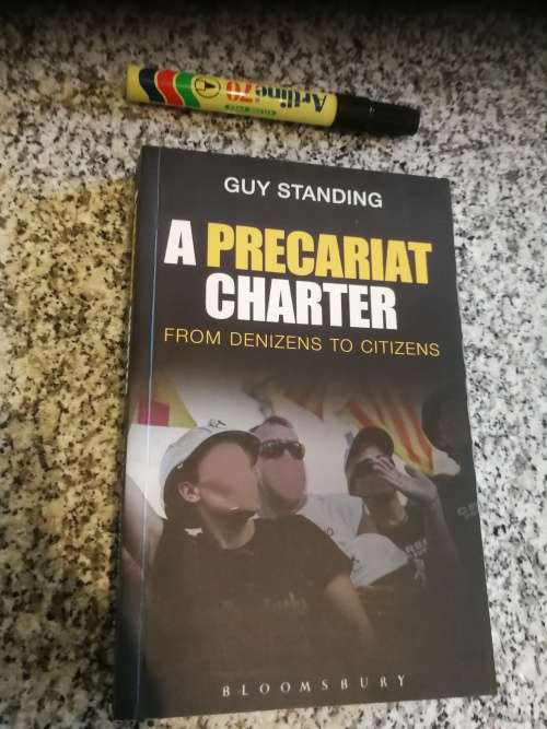 THE PRECARIAT CHARTER GUY STANDING