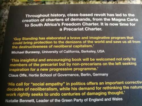 THE PRECARIAT CHARTER GUY STANDING