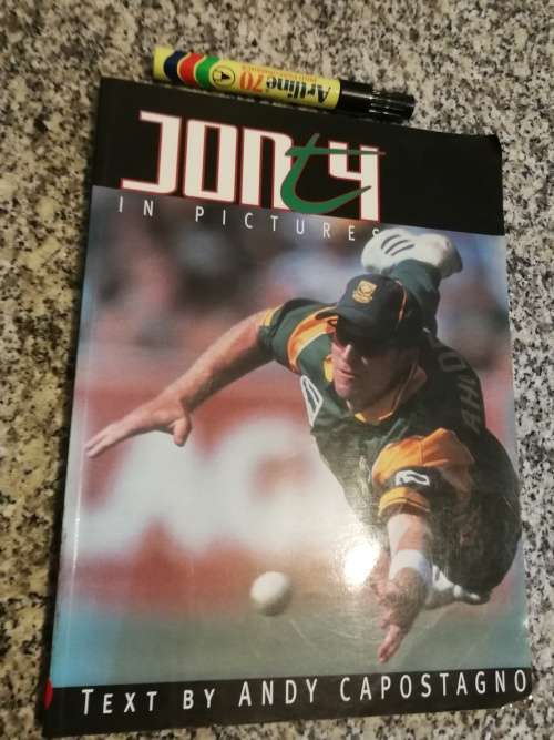 JONTY IN PICTURES  ANDY CAPOSTAGNO ( Signed by both Jonty Rhodes and Andy Capostagno ) cricket