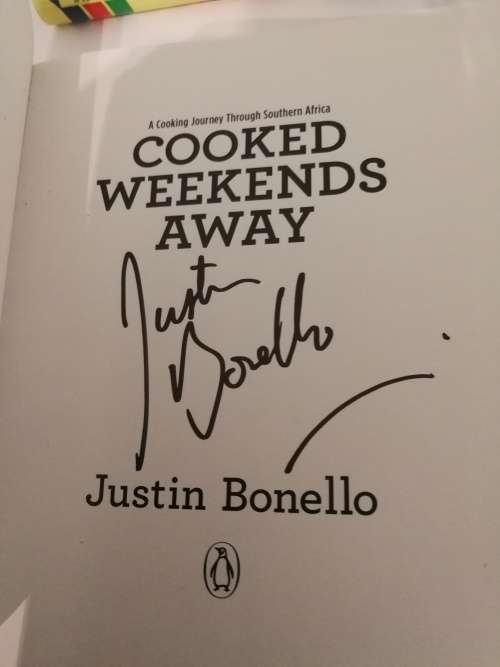 2 Books by JUSTIN BONELLO  COOKED IN AFRICA + COOKED WEEKENDS AWAY note 2ND Book is Signed by Justin