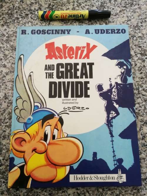 ASTERIX AND THE GREAT DIVIDE by  R Goscinny and A Uderzo ( Hardcover )