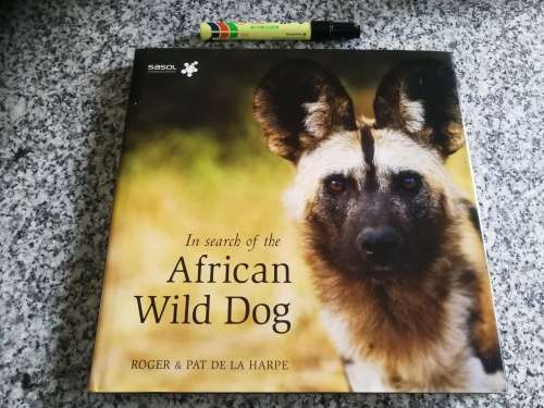 Signed by both Authors IN SEARCH OF THE AFRICAN WILD DOG ROGER and PAT DE LA HARPE  signed