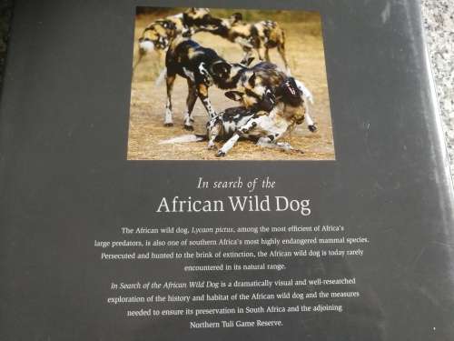 Signed by both Authors IN SEARCH OF THE AFRICAN WILD DOG ROGER and PAT DE LA HARPE  signed