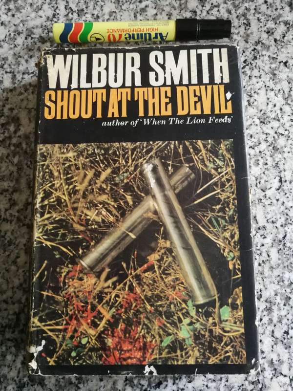 WILBUR SMITH SHOUT AT THE DEVIL  HEINEMAN 1978 First Edition 1968