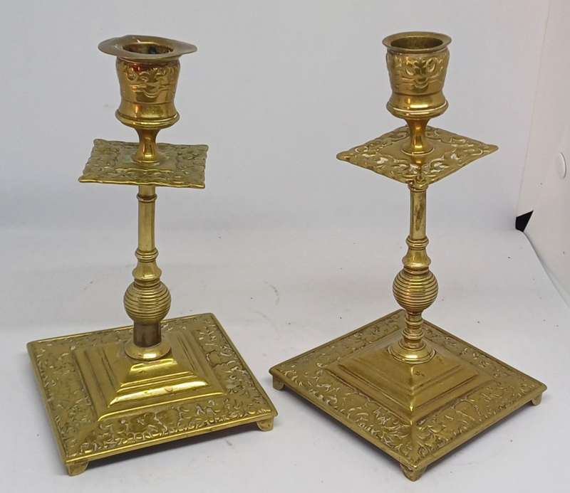 Two brass candle holders