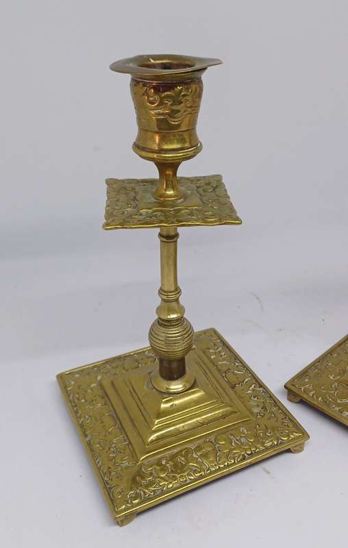 Two brass candle holders