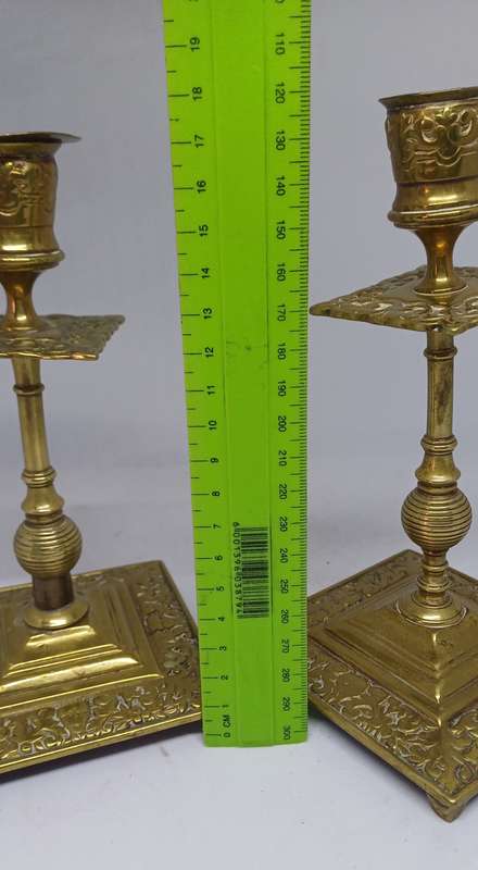 Two brass candle holders