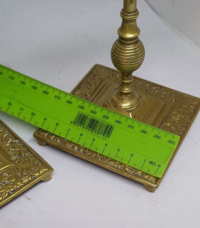 Two brass candle holders