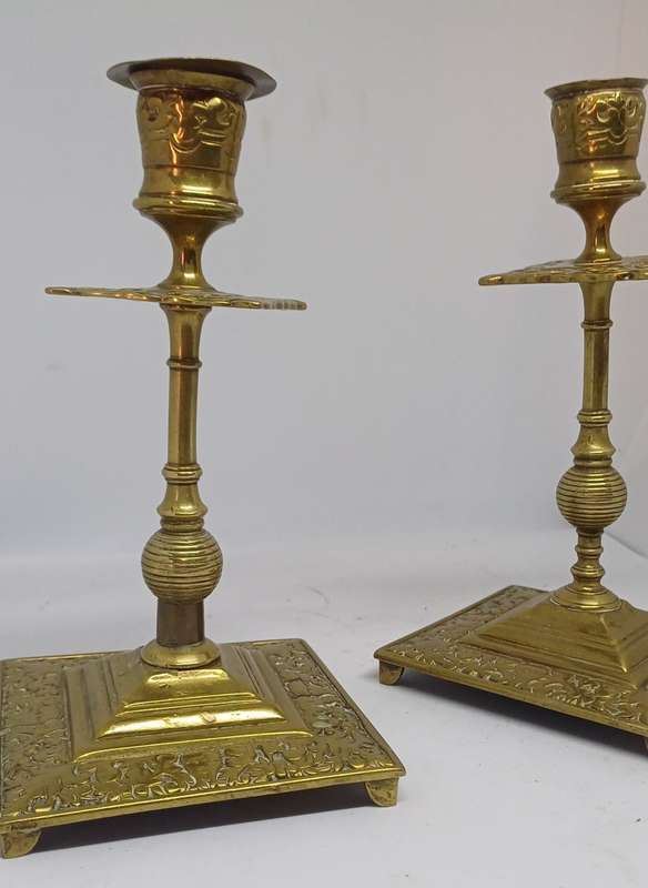 Two brass candle holders