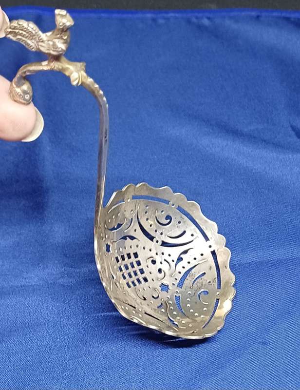 Silver sugar sifter