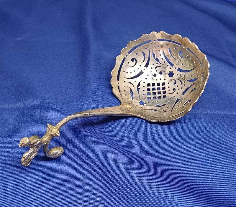 Silver sugar sifter