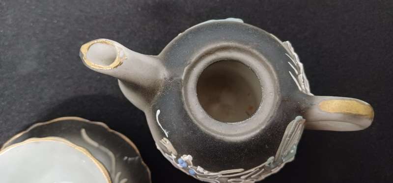 Miniature teapot and teacup