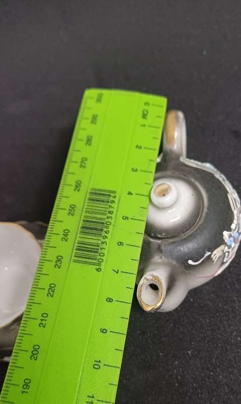 Miniature teapot and teacup