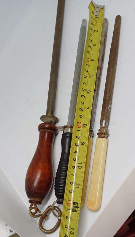Four hand knife sharpening steels