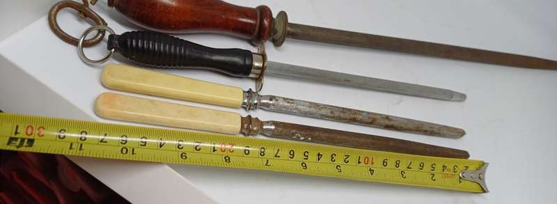 Four hand knife sharpening steels