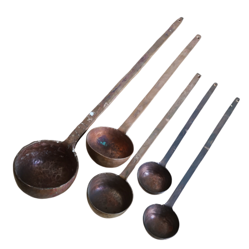Set of 5 Middle Eastern hand crafted hammered copper ladles, early to mid 1900s