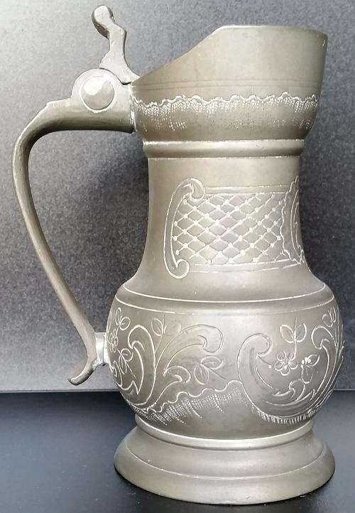 Beautiful Pewter Jug with ornate engravings