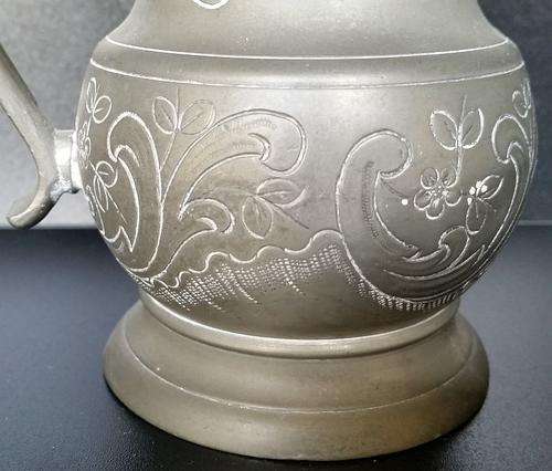 Beautiful Pewter Jug with ornate engravings