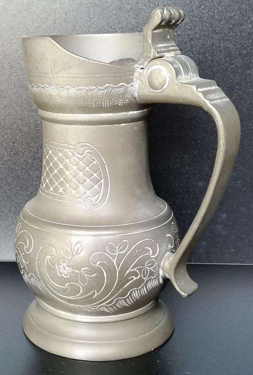Beautiful Pewter Jug with ornate engravings