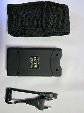 Tazer with built in torch - 1.8 Million Volts - (m)