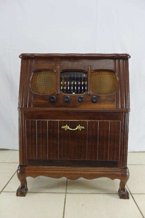 Vintage Imbuia ball and claw radio cabinet