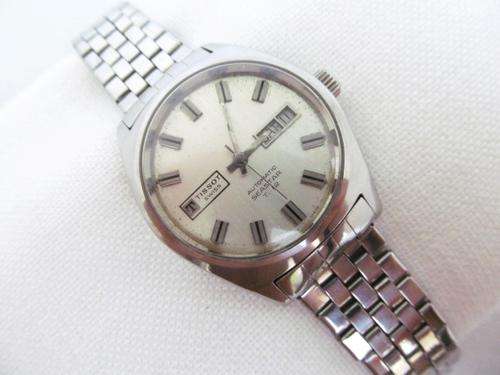 VERY RARE TISSOT T-12 DAYDATE STAINLESS STEEL AUTOMATIC MENS WATCH