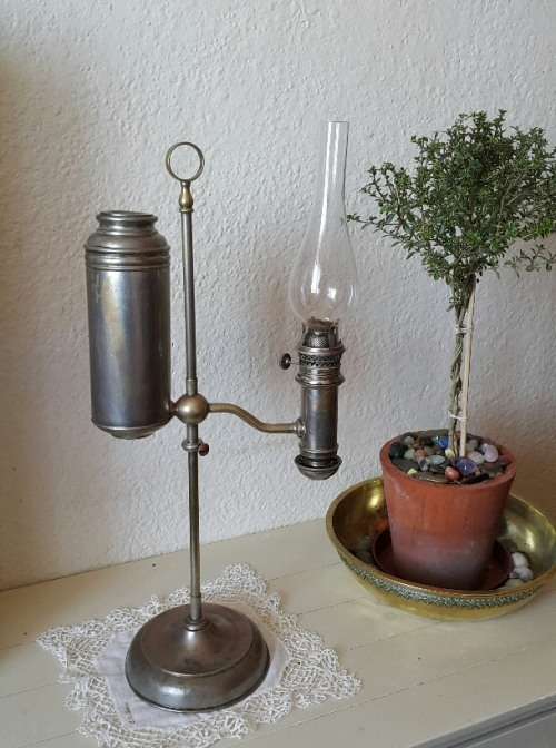 Antique student oil ¿ kerosene lamp, working