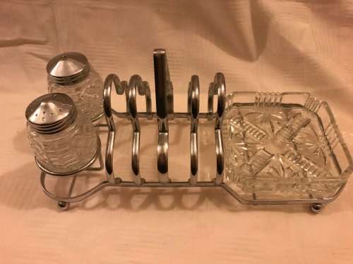 Chromed toast rack with butter dish and shares