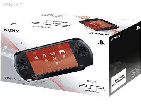 Sony psp street PSP-E1004 CB (demo unit) Charcoal Black with 1 game + 2 demo's