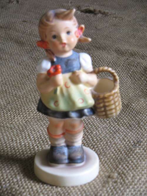 Girl with basket and flower Hummel figurine