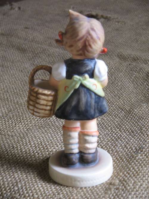Girl with basket and flower Hummel figurine