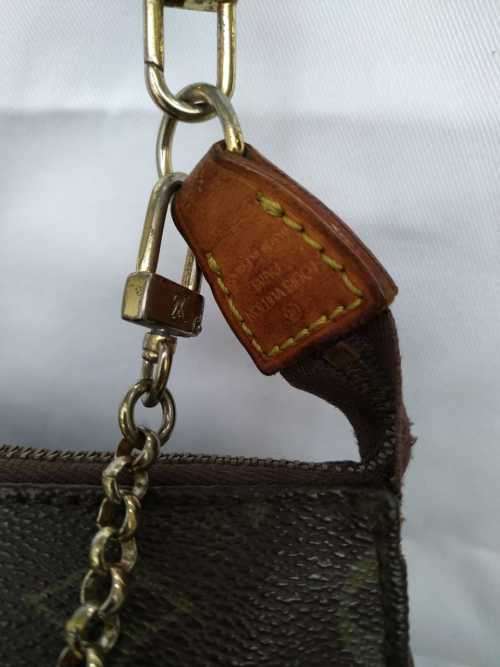 Louis Vuitton Monogram Sophie Clutch Bag