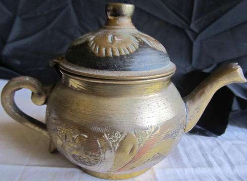 copper and brass tea pot