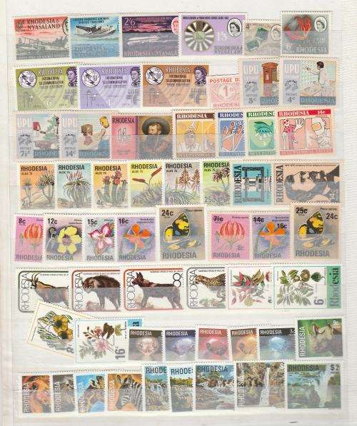 RHOD,RHOD&NYASALAND-ASSORTED UM SETS ON STOCK PAGE,GOOD VALUE LOT-FINE