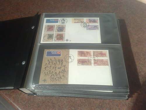 SWA & NAMIBIA-GOOD CONDITION FDC ALBUM WITH 125 PLUS FDC-LOOKS CLEAN LOT