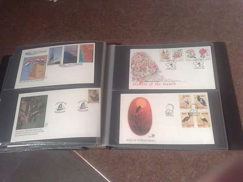 SWA & NAMIBIA-GOOD CONDITION FDC ALBUM WITH 125 PLUS FDC-LOOKS CLEAN LOT