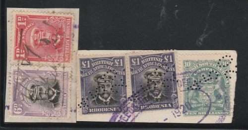 BSAC  RHODESIA-KGV ADMIRAL-2 X RARE ONE POUND FISCALLY USED WITH 10/ARMS,S/RHOD ADMIRALS-ON PIECE