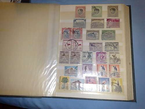 LARGE CLEARANCE LOT-7 ALBUMS,50 PACKETS LOOSES STAMPS,PLUS 2 BAGS LOOSE STAMPS FREE!!